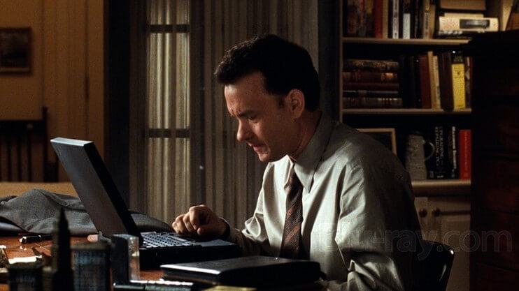 Tom Hanks escreve um e-mail para Meg Ryan.